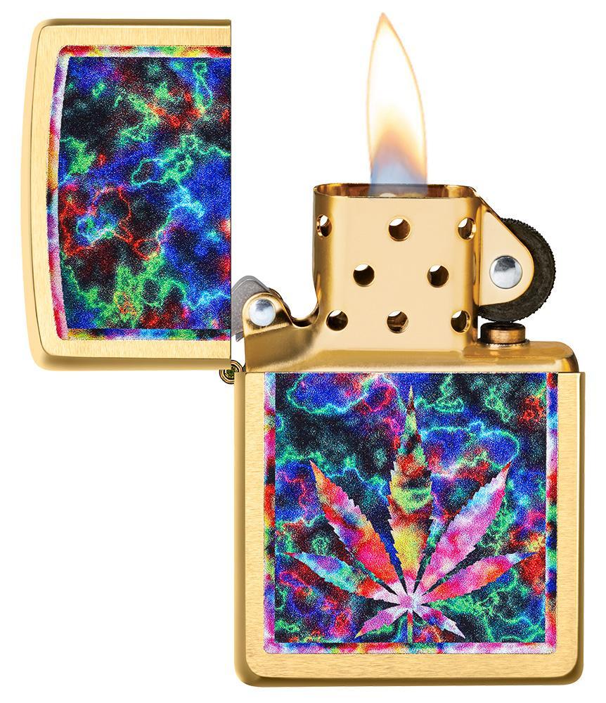 Leaf Design Brushed Brass Windproof Lighter with its lid open and lit