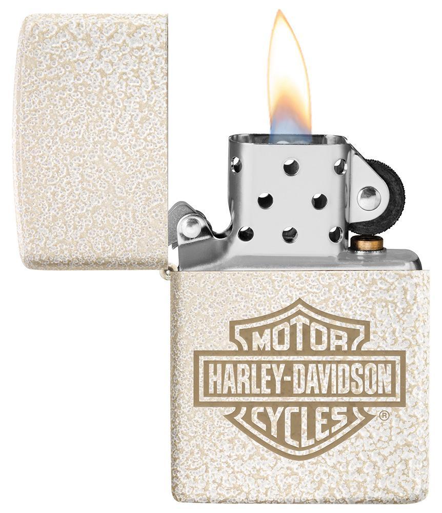 Harley-Davidson® Bar and Shield Logo Mercury Glass Windproof Lighter with its lid open and lit