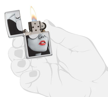 Gold Design High Polish Chrome Lighter lit in hand