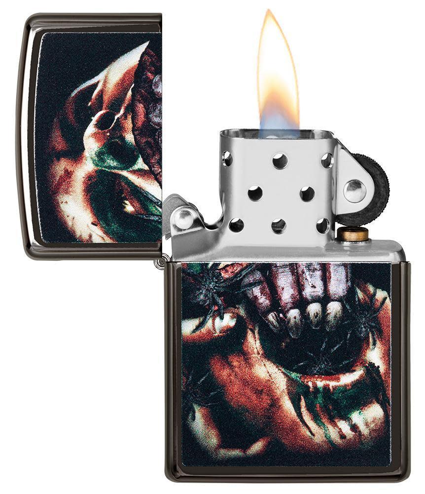 Lifestyle image of Split Face Design Windproof Lighter laying flat on neon colored background