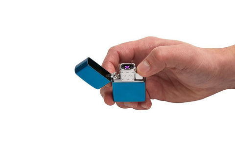 Arc Lighter Insert lit in hand, showing the double arc