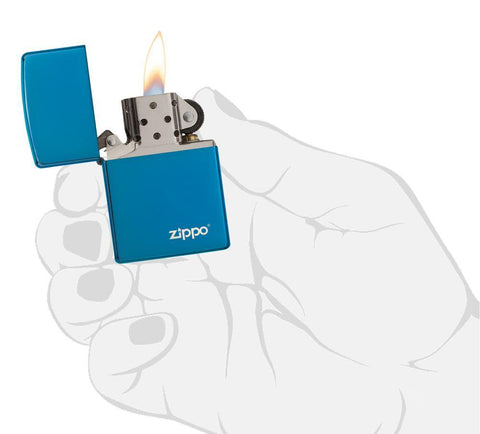 Classic High Polish Blue Zippo Logo Windproof Lighter lit in hand