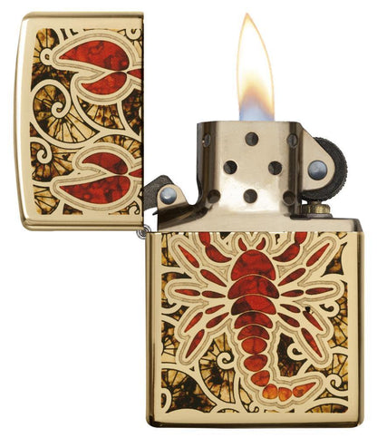 Fusion Scorpion High Polish Brass Windproof Lighter with its lid open and lit