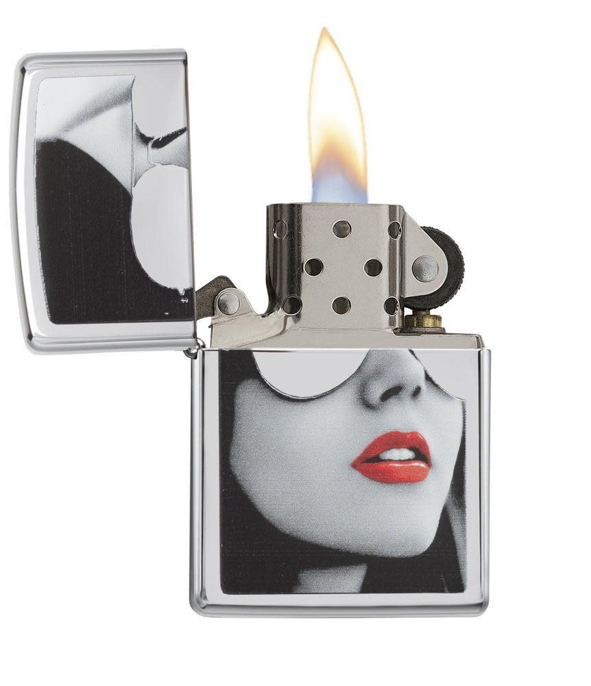 Gold Design High Polish Chrome Lighter with its lid open and lit