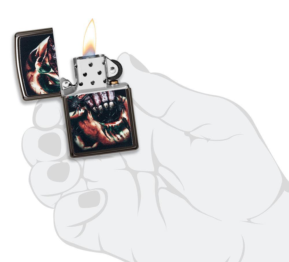 Split Face Design High Polish Black windproof lighter with its lid open and lit