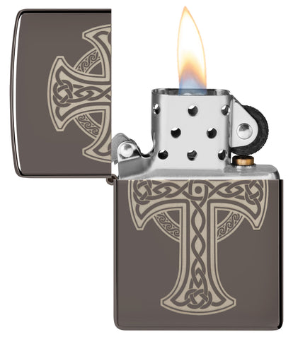 Zippo Laser Engraved Celtic Cross Design Black Ice Windproof Lighter with its lid open and lit.