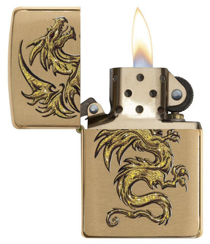 Dragon Design Brushed Brass Windproof Lighter with its lid open and lit