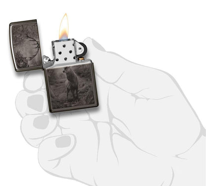 Deer Design Black Ice® Lighter lit in hand