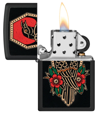 Zippo Crow Tattoo Design Black Matte Windproof Lighter with its lid open and lit.