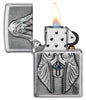 Anne Stokes Gothic Prayer Emblem Brushed Chrome Windproof Lighter lit in hand.